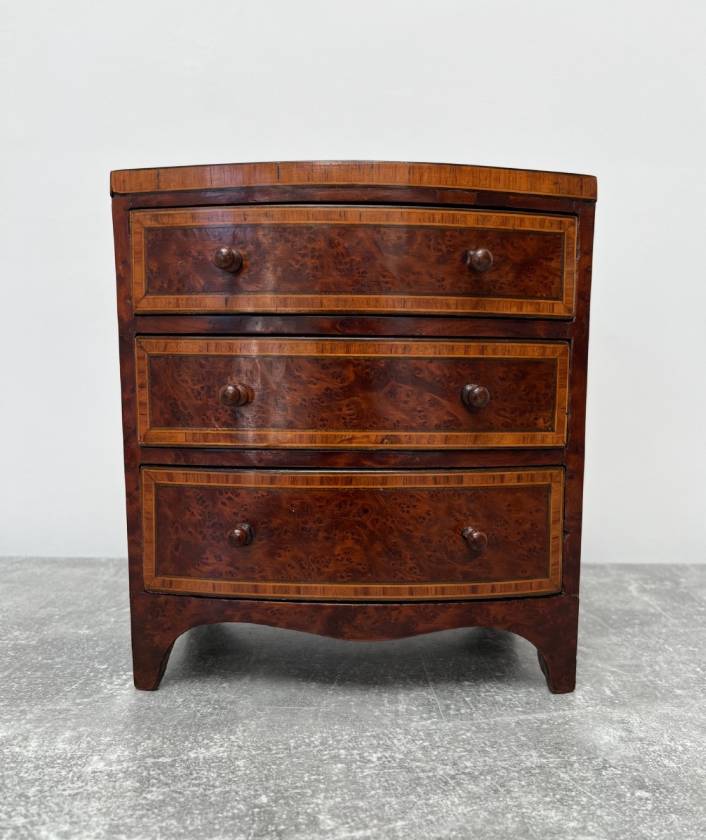 miniature amboyna chest of drawers