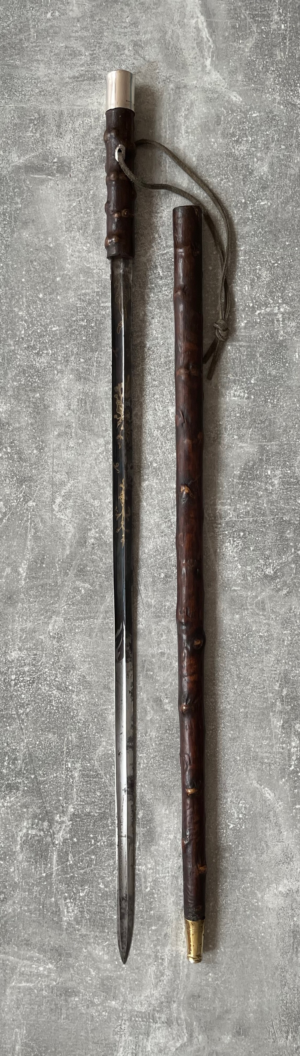 leather covered sword stick silver knop decorated blade