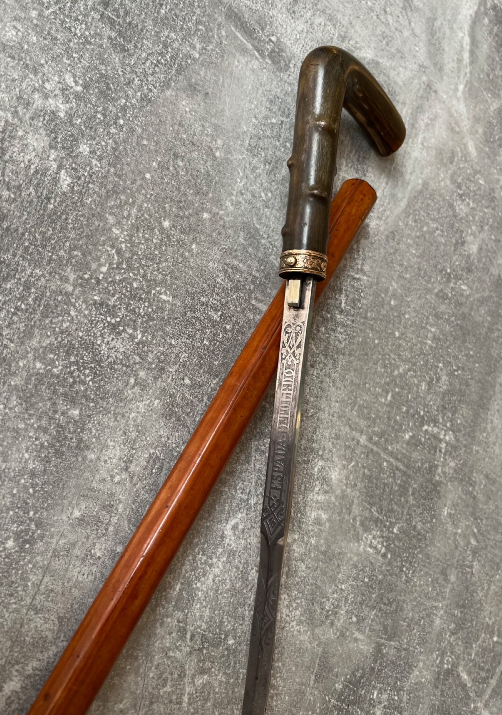 malacca sword stick with etched toledo blade and button release